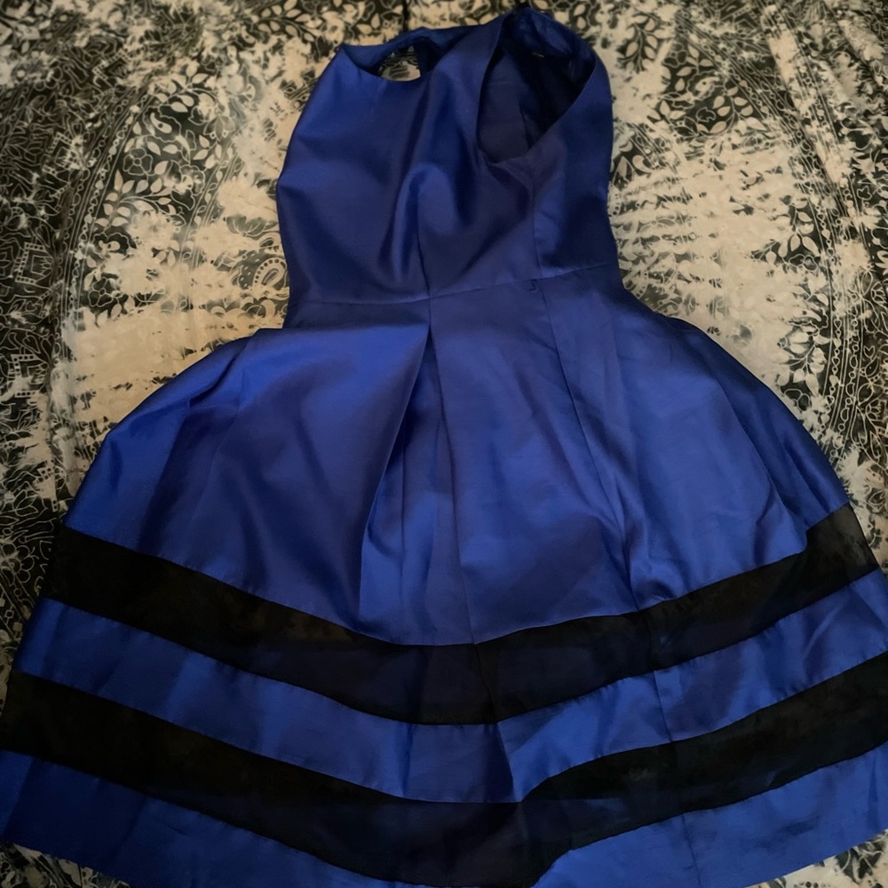 Blue silk dress with bell bottom shape and black mesh detail
